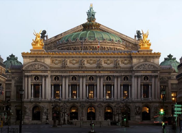 This photo appears to be the facade of the Palais Garnier in Paris, which is due for restoration.