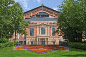 This photo appears to show the Bayreuth Festspielhaus on a sunny summer day.