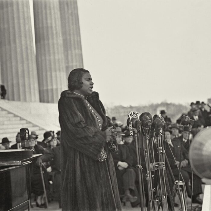 This photo appears to be that of Marian Anderson singing at the Lincoln Memorial on Easter Sunday 1939.