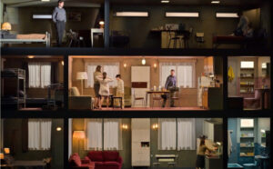 The image shows a three-story set representing an apartment building from in Filidei's opera, L'Inondation.