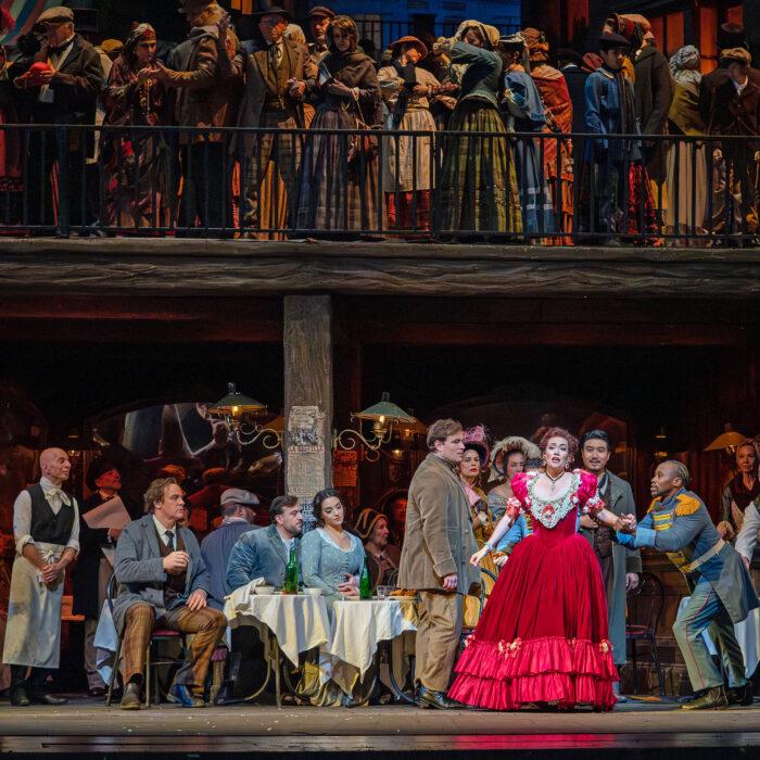 This is a photo of Act 2 of Puccini's La Boheme at the Met Opera